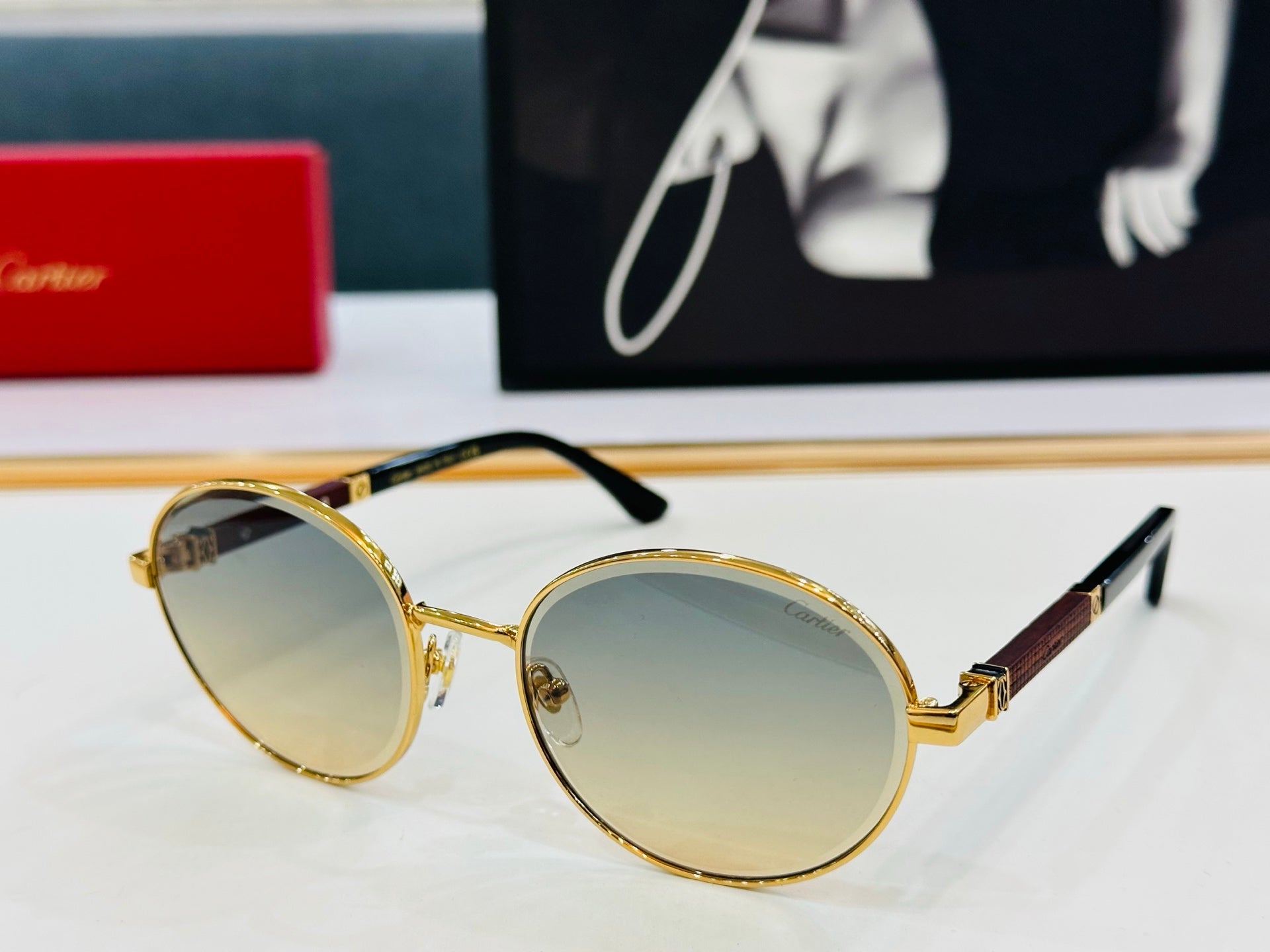 CARTIER PREMIÈRE ROUND FRAME SUNGLASSES CT0490S IN METAL
