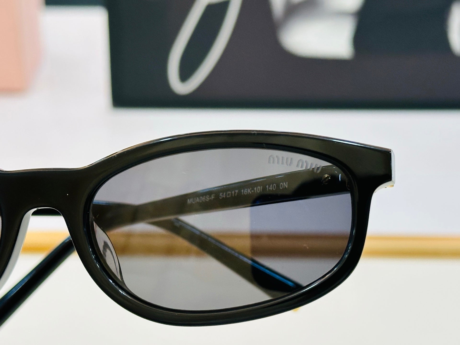 MIU MIU SUNGLASSES IN RECTANGULAR ACETATE 646116