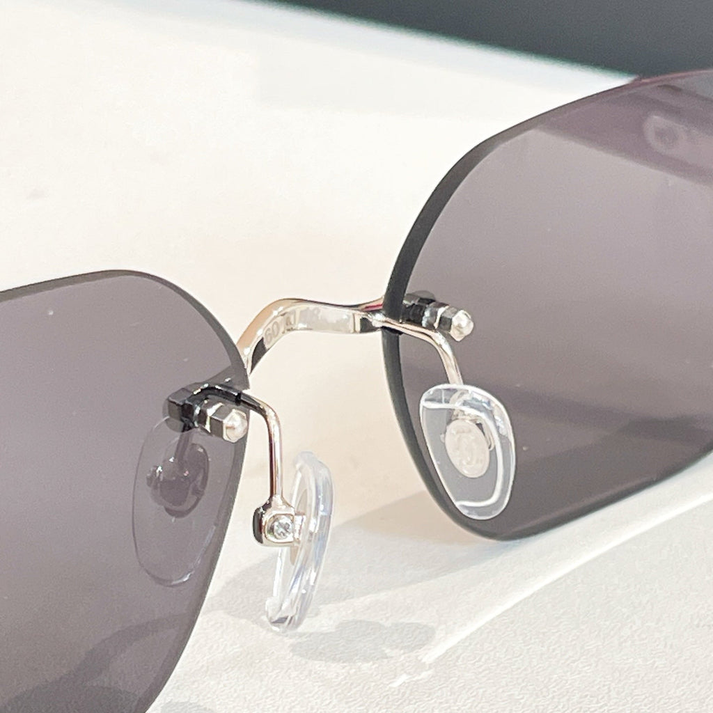 CARTIER RIMLESS GEOMETRIC FRAME SUNGLASSES 579510 IN METAL AND WOODEN