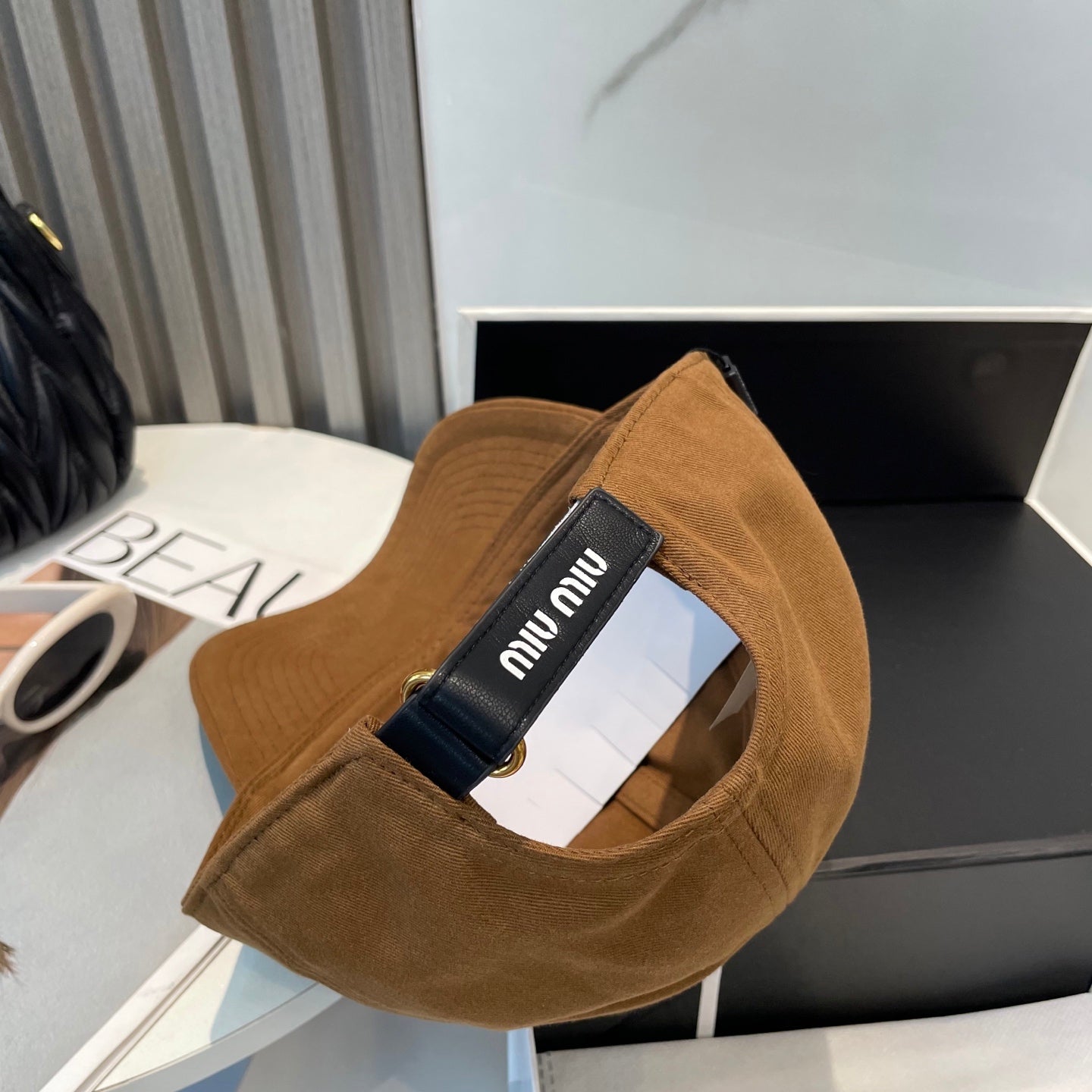 MIU MIU MM BASEBALL CAP IN BURNT ORANGE FABRIC BRAND EMBROIDERY
