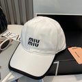 MIU MIU MM BASEBALL CAP IN WHITE AND BLACK FABRIC STYLE 1
