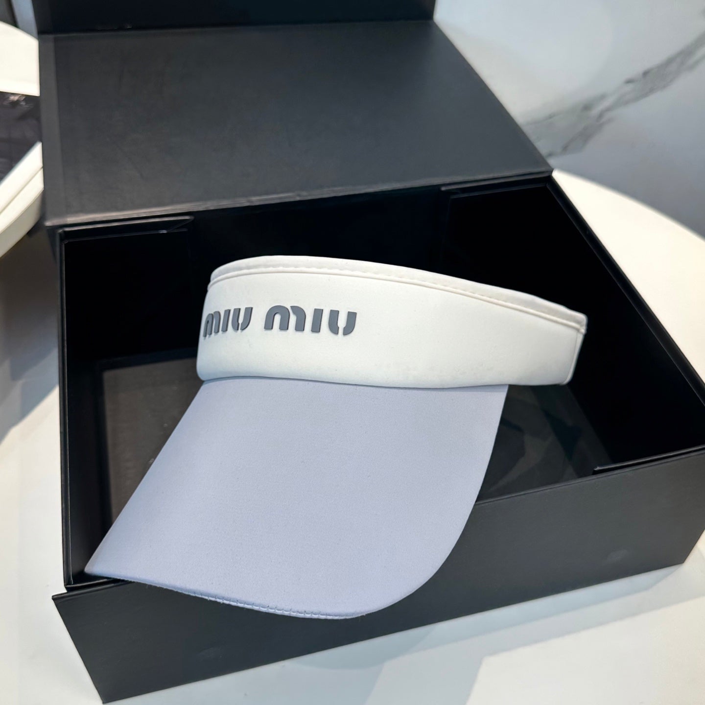 MIU MIU MM SPORT VISOR CAP IN COOL GRAY MIX WHITE FABRIC