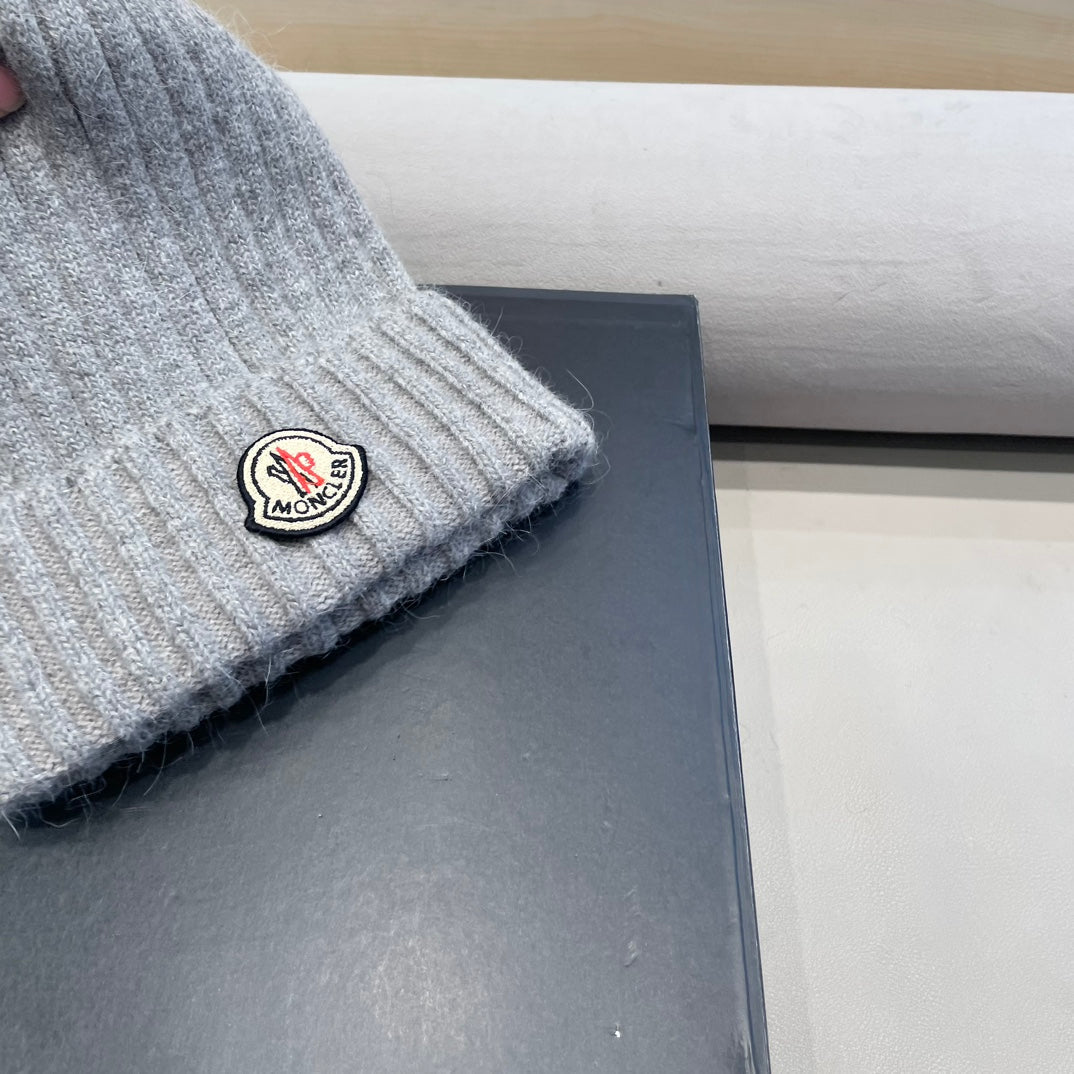 MONCLER BEANIE HAT IN ASH GRAY WOOL WITH POM POM 438107