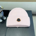 MONCLER BEANIE HAT IN PASTEL PINK WOOL 438125
