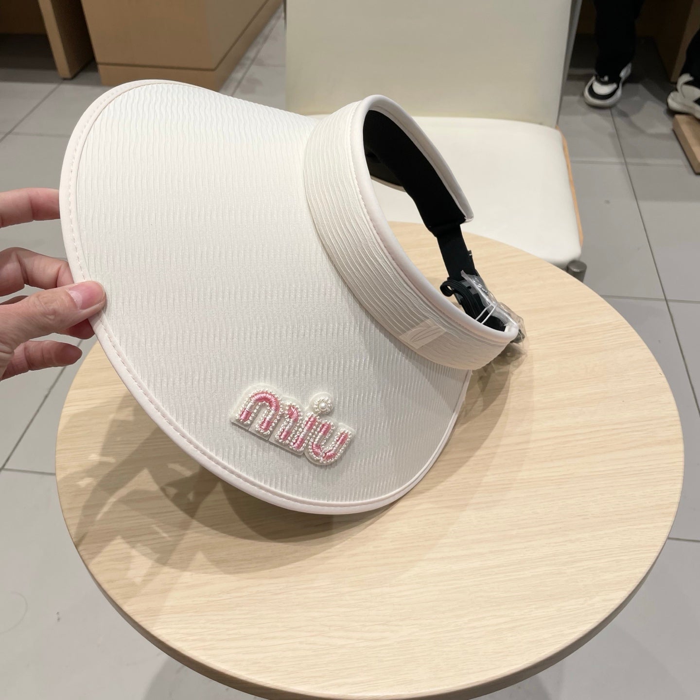 MIU MIU MM FASHION VISOR CAP IN BLACK AND WHITE WITH LOGO TEXT EMBROIDERY