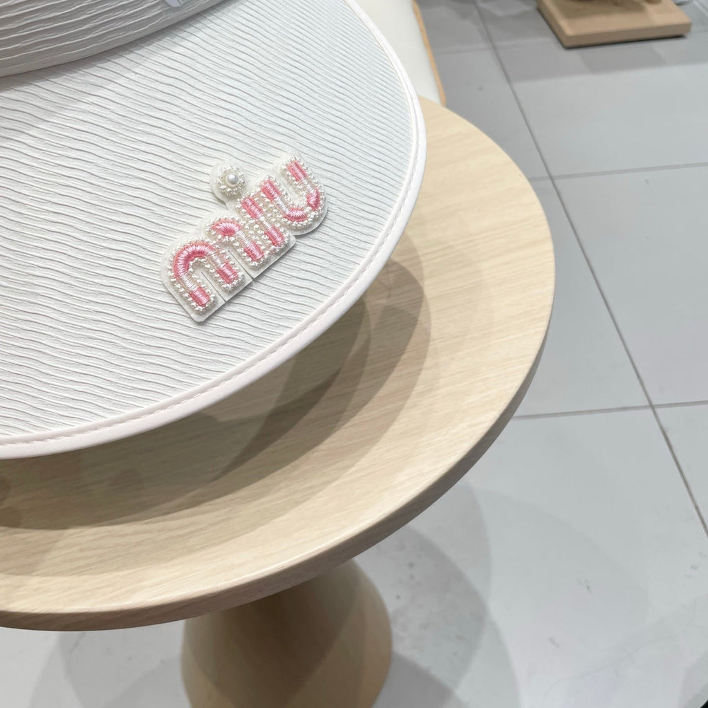 MIU MIU MM FASHION VISOR CAP IN BLACK AND WHITE WITH LOGO TEXT EMBROIDERY