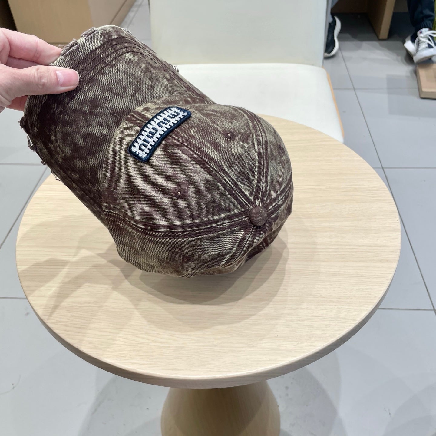 MIU MIU MM DISTRESSED FABRIC BASEBALL CAP IN BROWN WITH EMBROIDERED LOGO