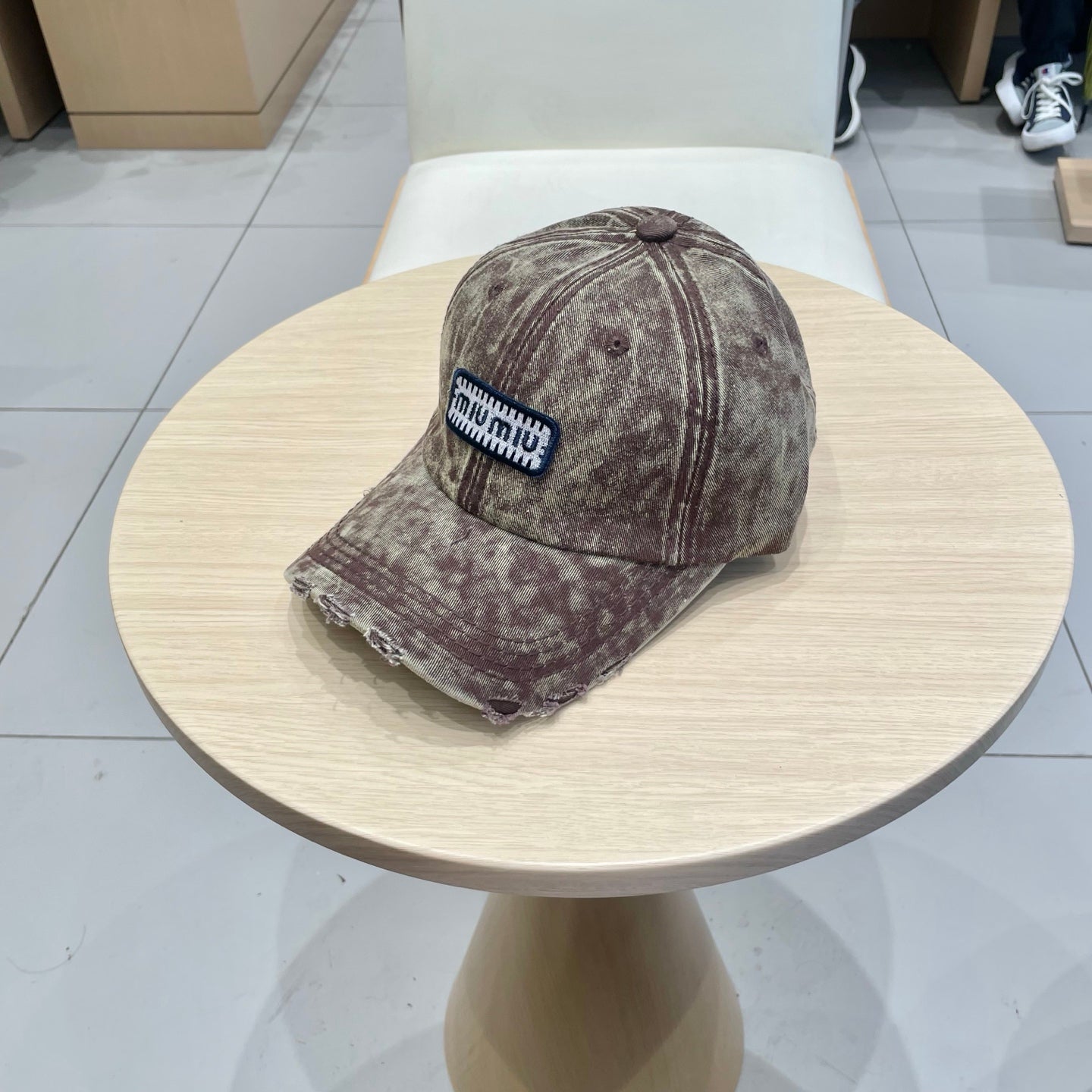 MIU MIU MM DISTRESSED FABRIC BASEBALL CAP IN BROWN WITH EMBROIDERED LOGO