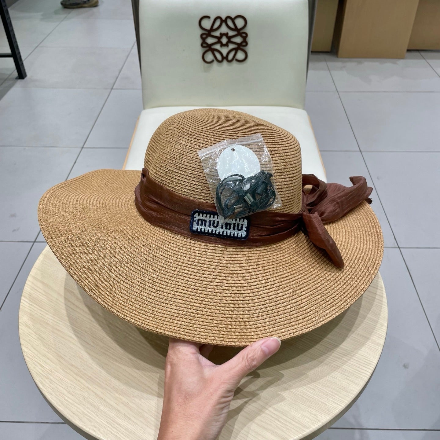 MIU MIU MM WIDE-BRIM BEACH HAT IN BEIGE WITH FABRIC BOW
