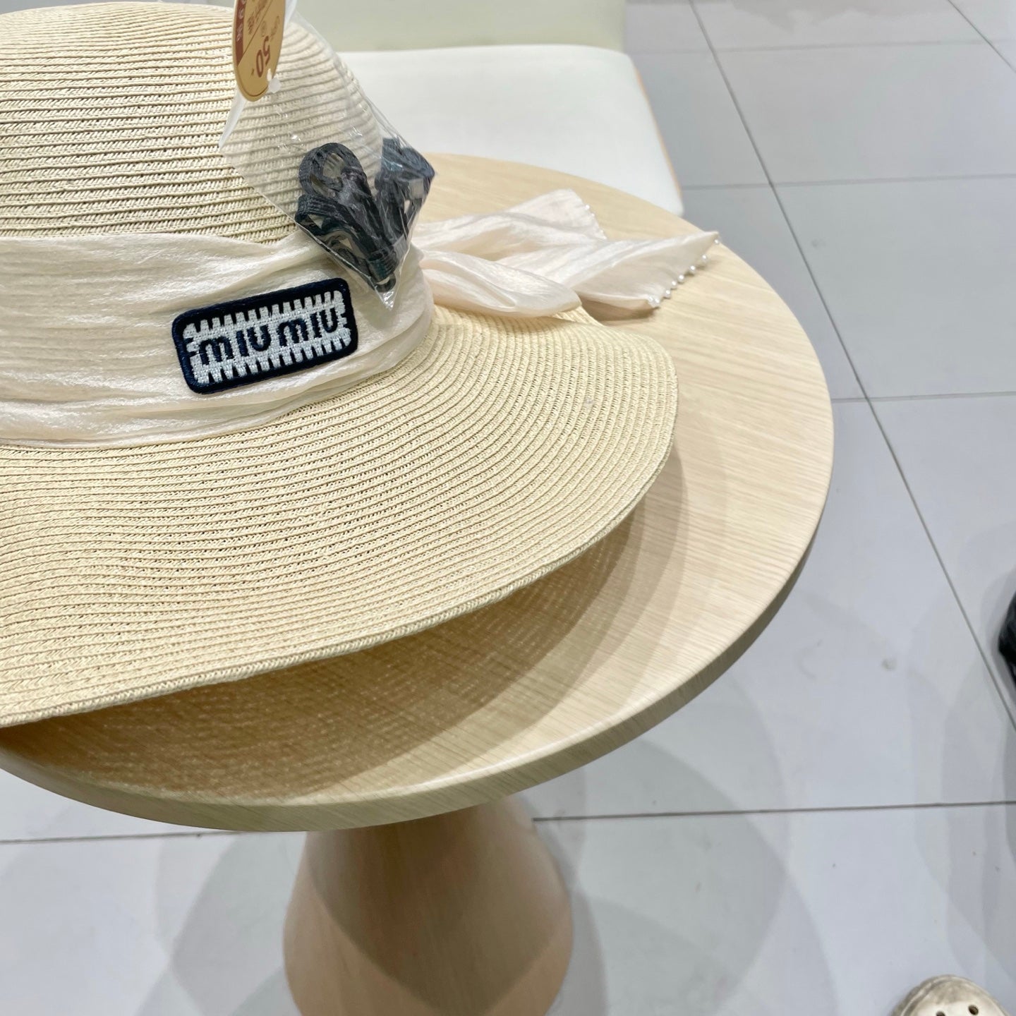 MIU MIU MM WIDE-BRIM BEACH HAT IN LIGHT BEIGE WITH FABRIC BOW