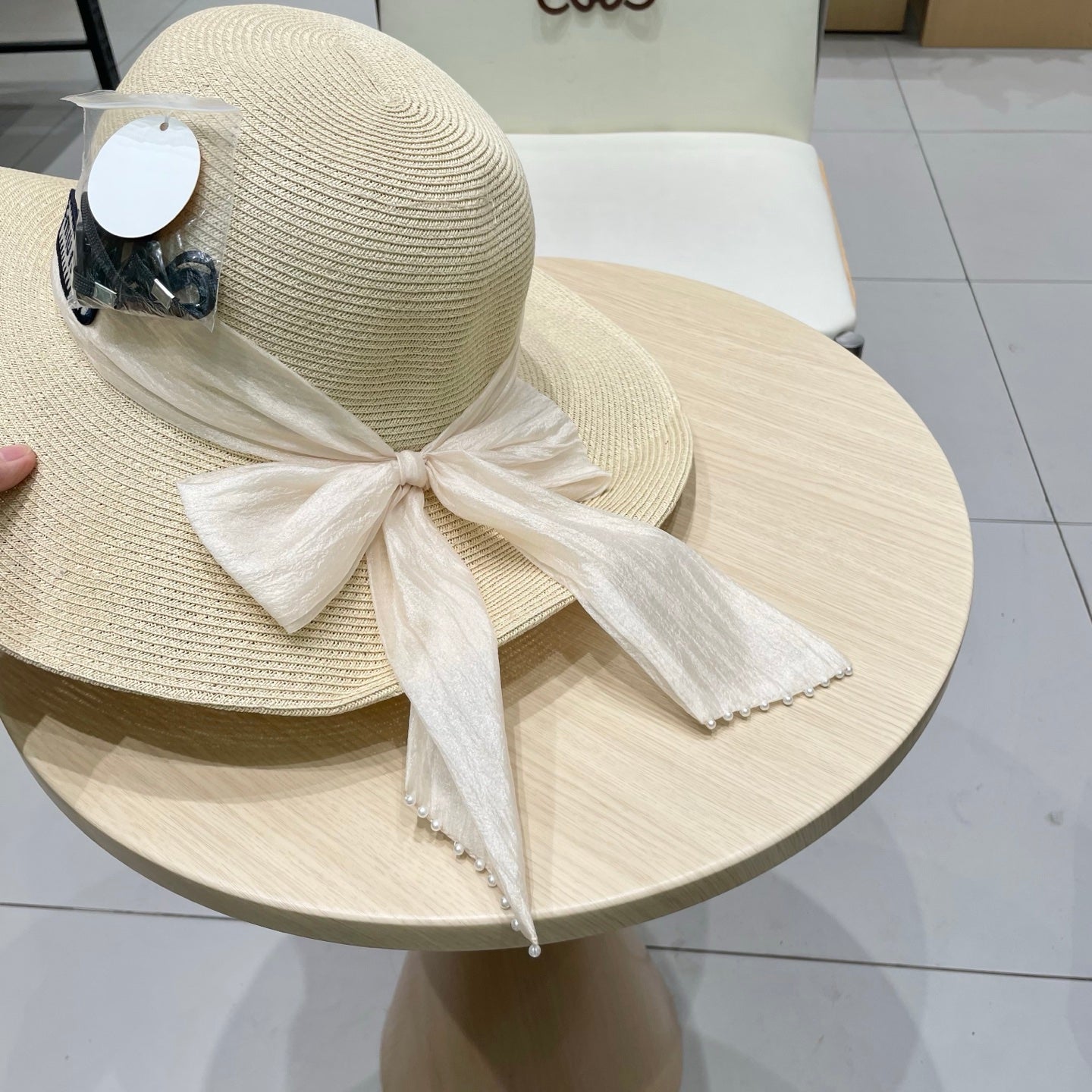 MIU MIU MM WIDE-BRIM BEACH HAT IN LIGHT BEIGE WITH FABRIC BOW