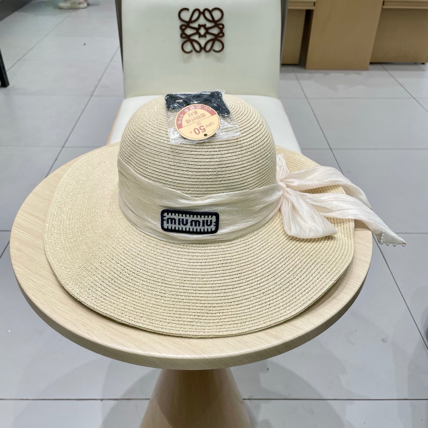 MIU MIU MM WIDE-BRIM BEACH HAT IN LIGHT BEIGE WITH FABRIC BOW