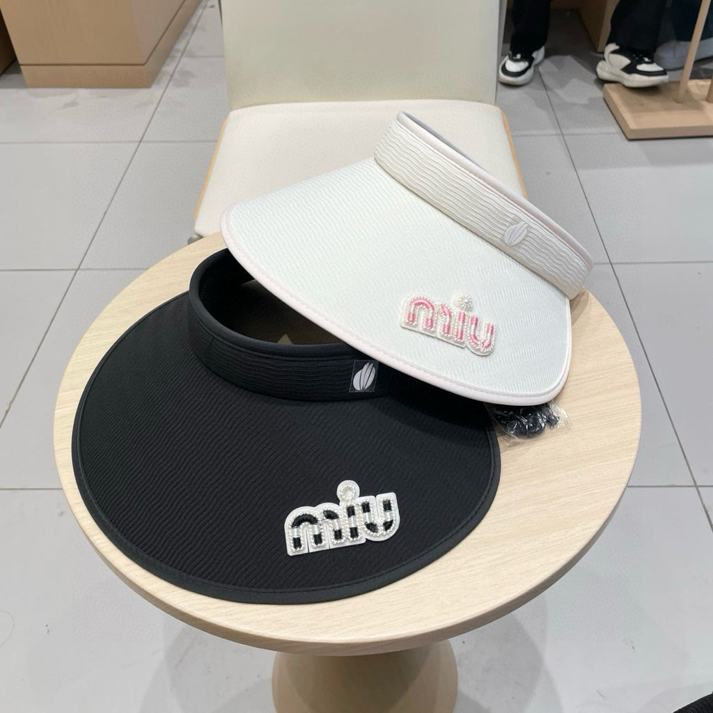 MIU MIU MM FASHION VISOR CAP IN BLACK AND WHITE WITH LOGO TEXT EMBROIDERY