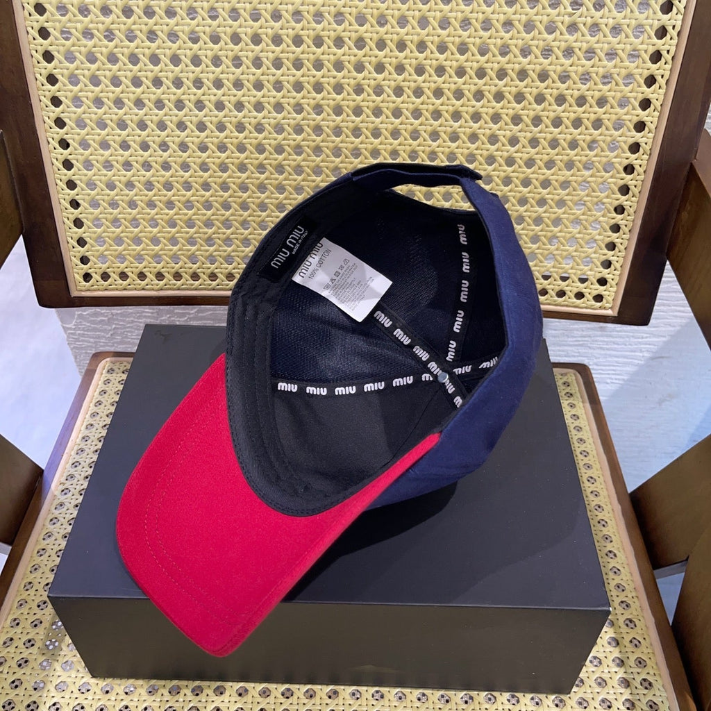 MIU MIU MM BASEBALL CAP IN NAVY BLUE AND RED FABRIC WITH LOGO EMBROIDERY