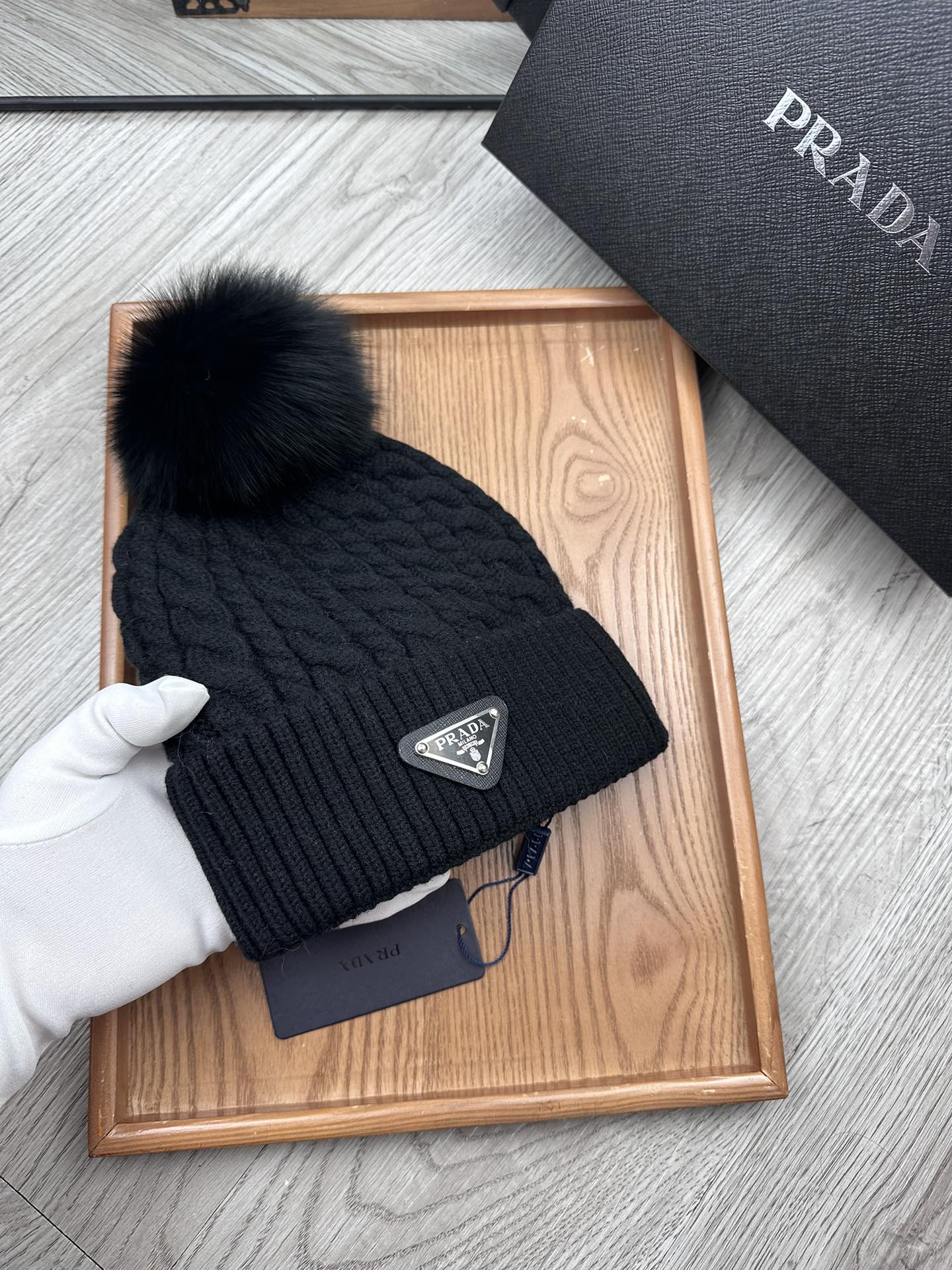 PRADA BEANIE HAT IN BLACK WOOL 352375