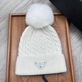 PRADA BEANIE HAT IN WHITE WOOL 352376