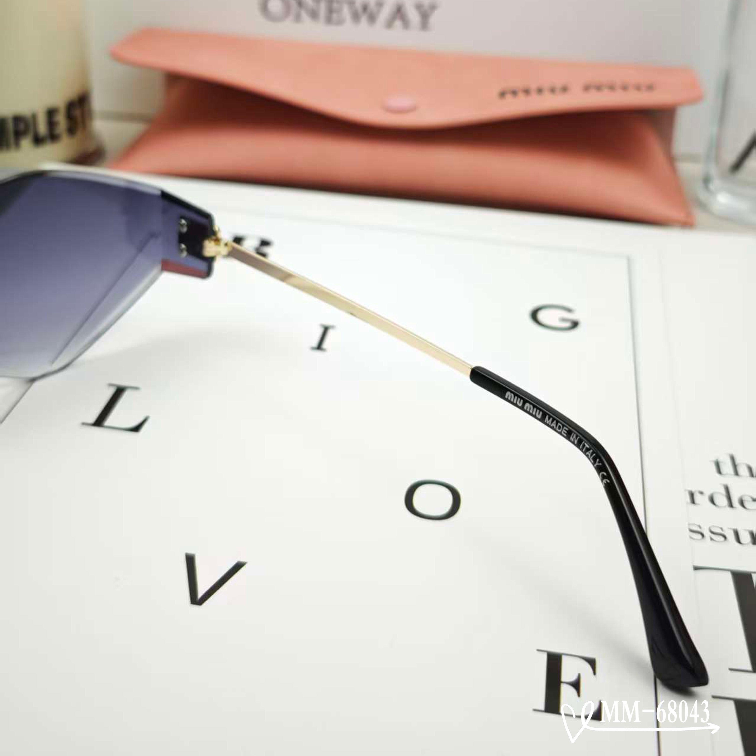 MIU MIU LOGO SUNGLASSES 68043 IN GOLD METAL GREY LENS