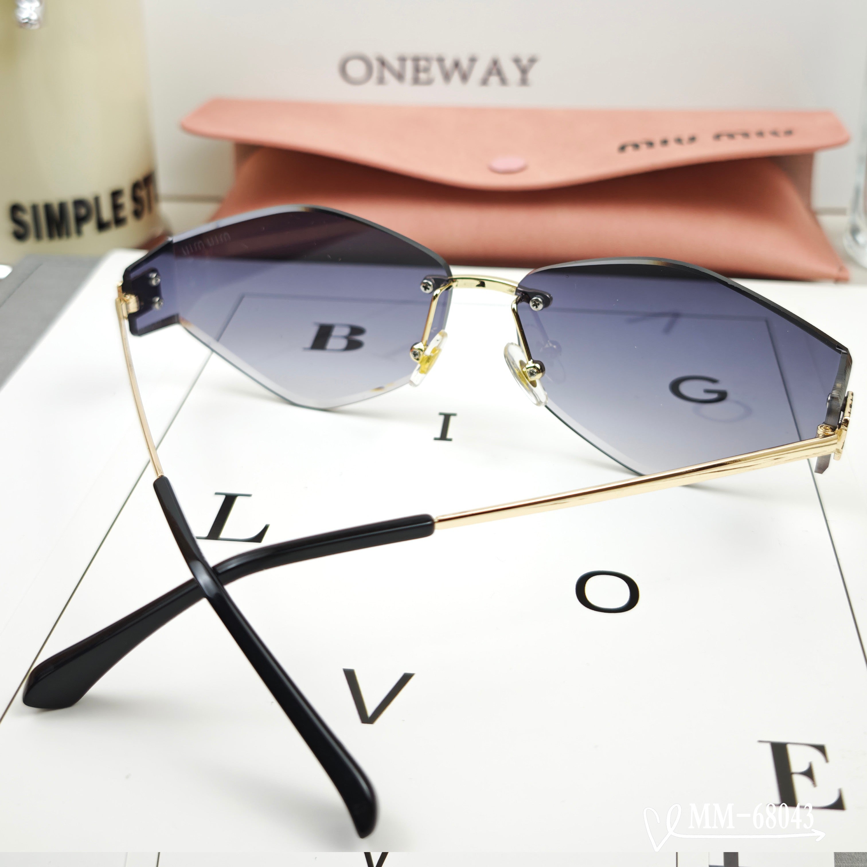 MIU MIU LOGO SUNGLASSES 68043 IN GOLD METAL GREY LENS
