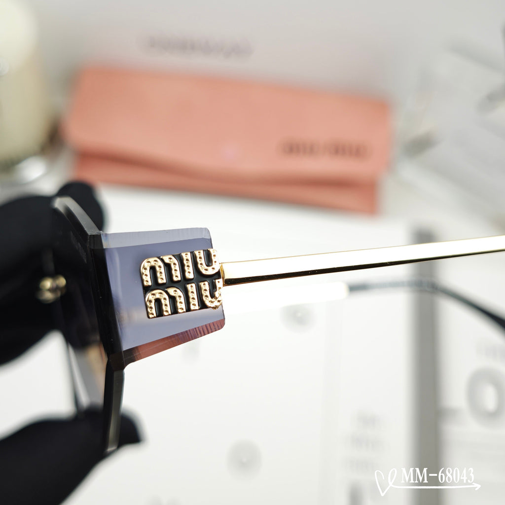 MIU MIU LOGO SUNGLASSES 68043 IN GOLD METAL GREY LENS