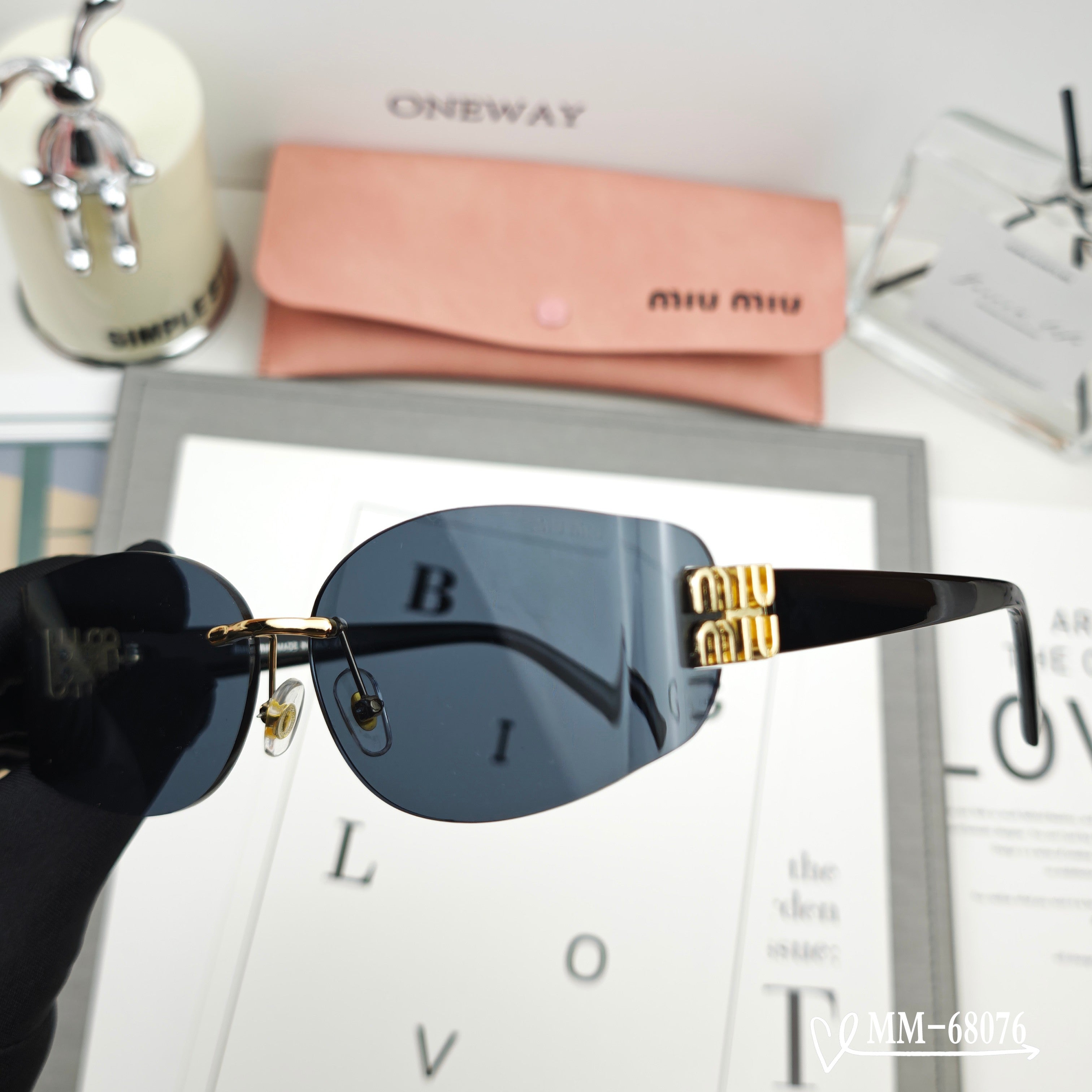 MIU MIU LOGO SUNGLASSES 68076 IN BLACK ACETATE