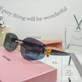 MIU MIU LOGO SUNGLASSES 68076 IN BLACK ACETATE