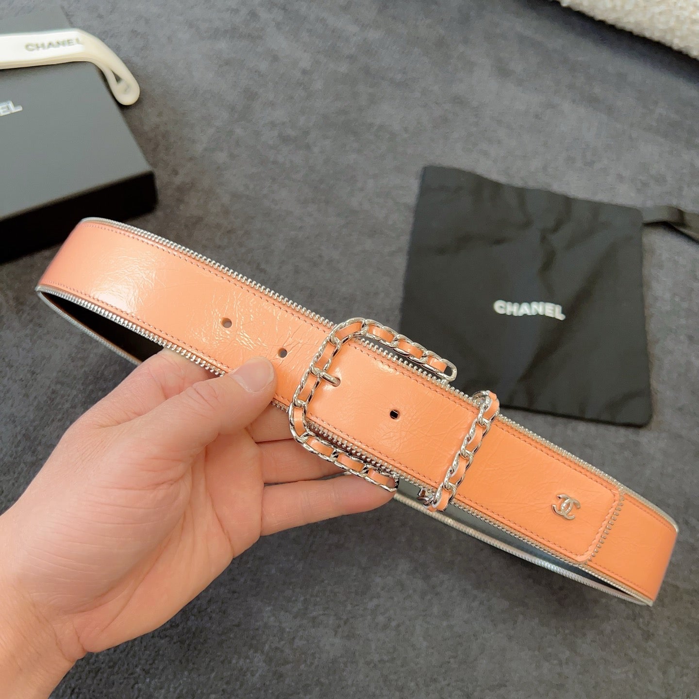 CHANEL BELT 40MM IN CORAL CALFSKIN WITH INTERWOVEN CHAIN BUCKLE ZIPPER IN TRIM SILVER HARDWARE