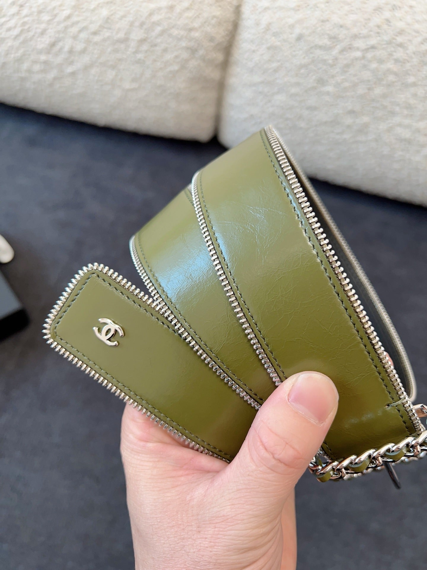 CHANEL BELT 40MM IN OLIVE GREEN CALFSKIN WITH INTERWOVEN CHAIN BUCKLE ZIPPER IN TRIM SILVER HARDWARE