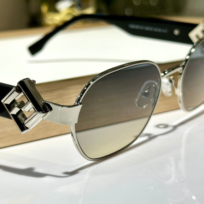 FENDI TRAVEL ROUND FRAME SUNGLASSES FE40148L IN METAL AND ACETATE