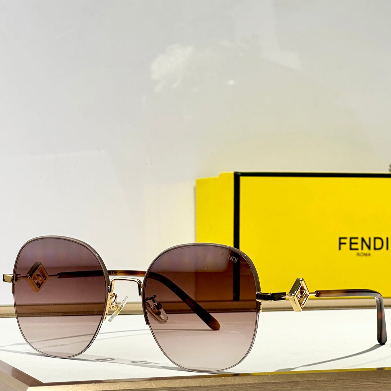 FENDI TRAVEL ROUND FRAME SUNGLASSES FD8136 IN METAL