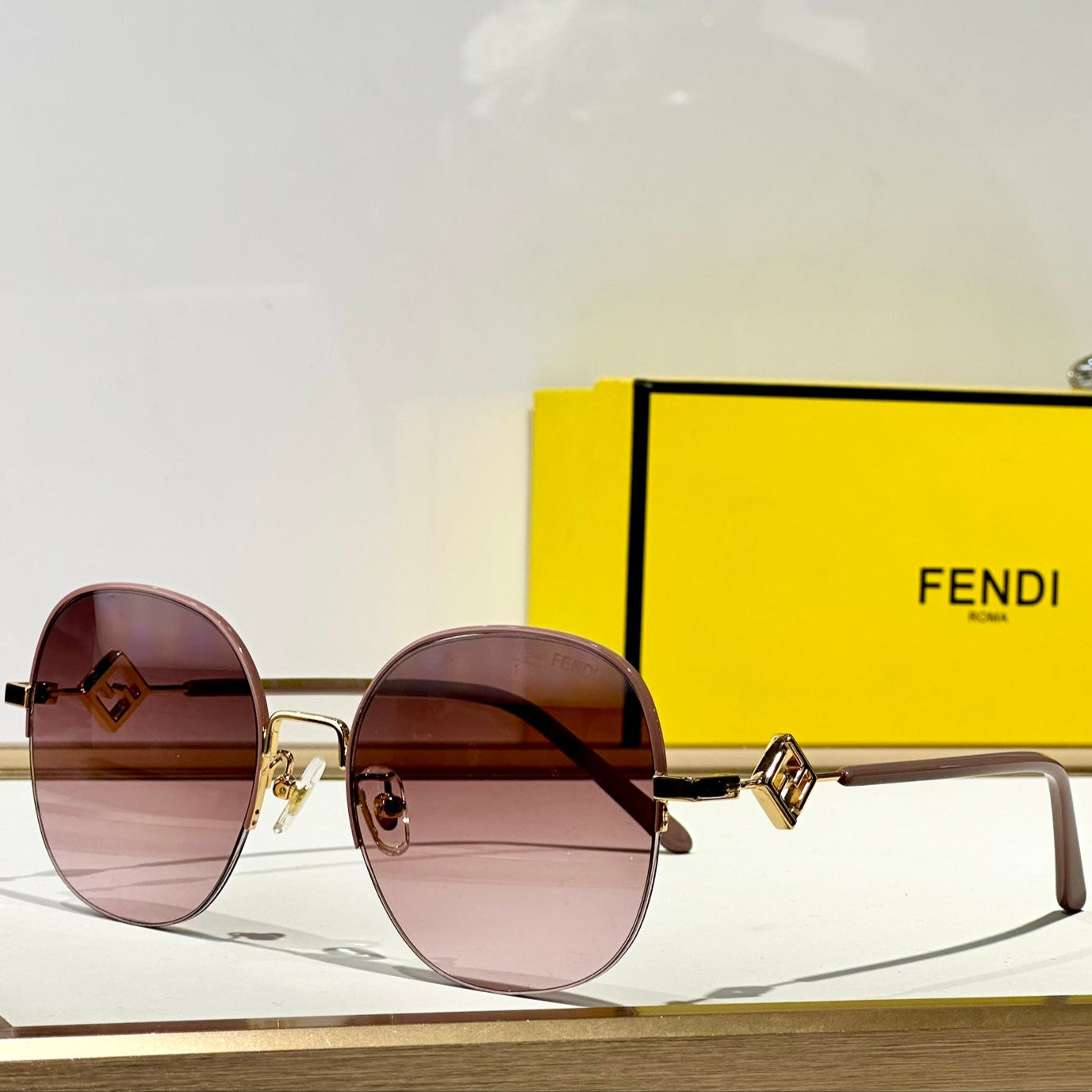 FENDI TRAVEL ROUND FRAME SUNGLASSES FD8136 IN METAL