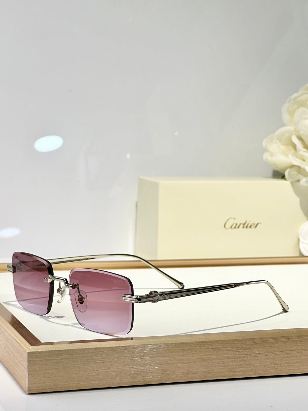 CARTIER RIMLESS SQUARE FRAME SUNGLASSES CT0610S IN METAL