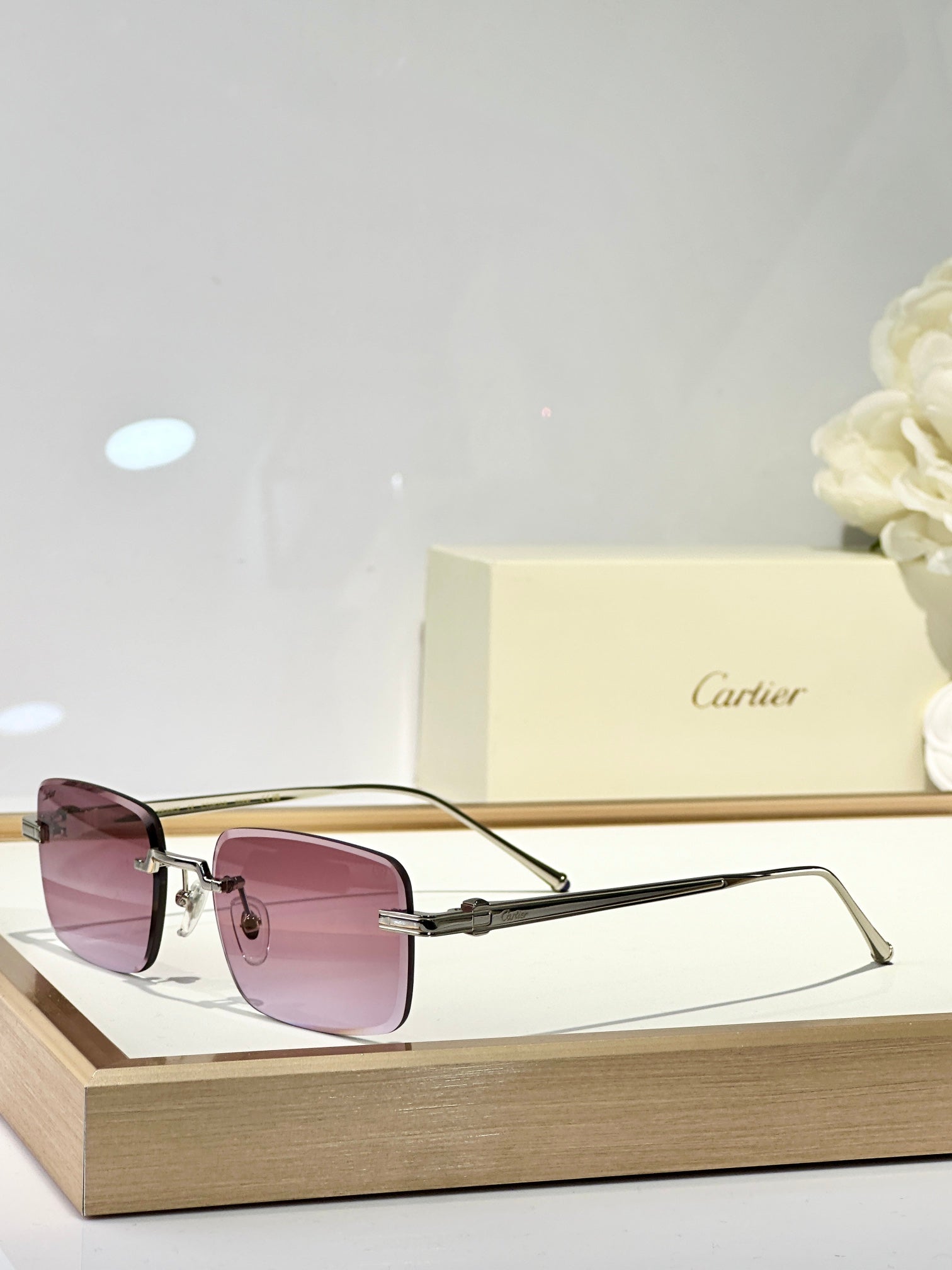 CARTIER RIMLESS SQUARE FRAME SUNGLASSES CT0610S IN METAL