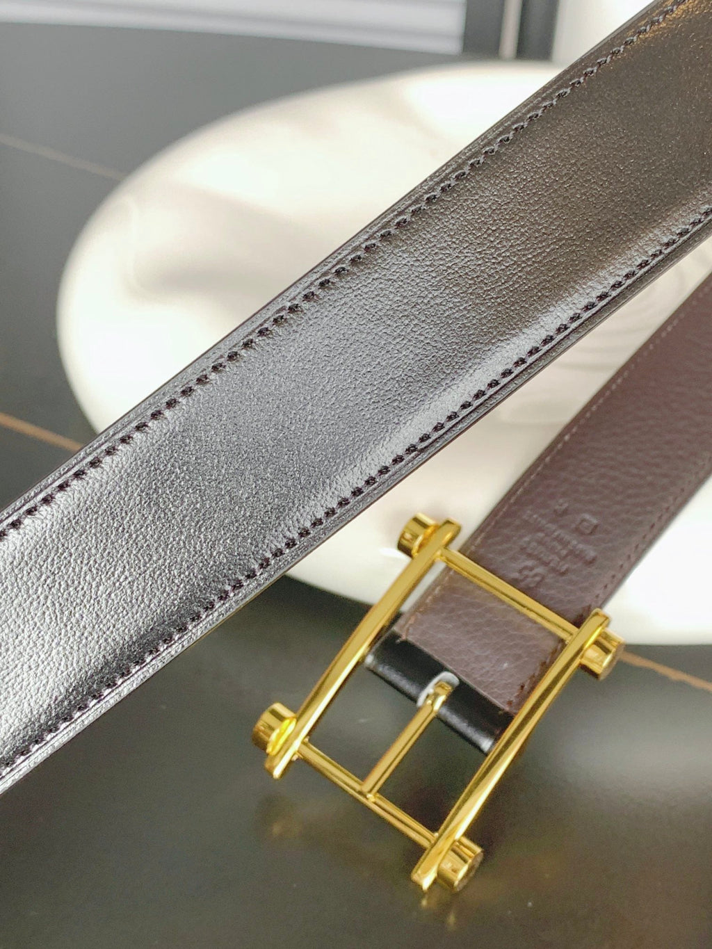 HERMES REVERSIBLE BLACK AND CHESTNUT BROWN LEATHER STRAP 32 MM GOLD HARDWARE