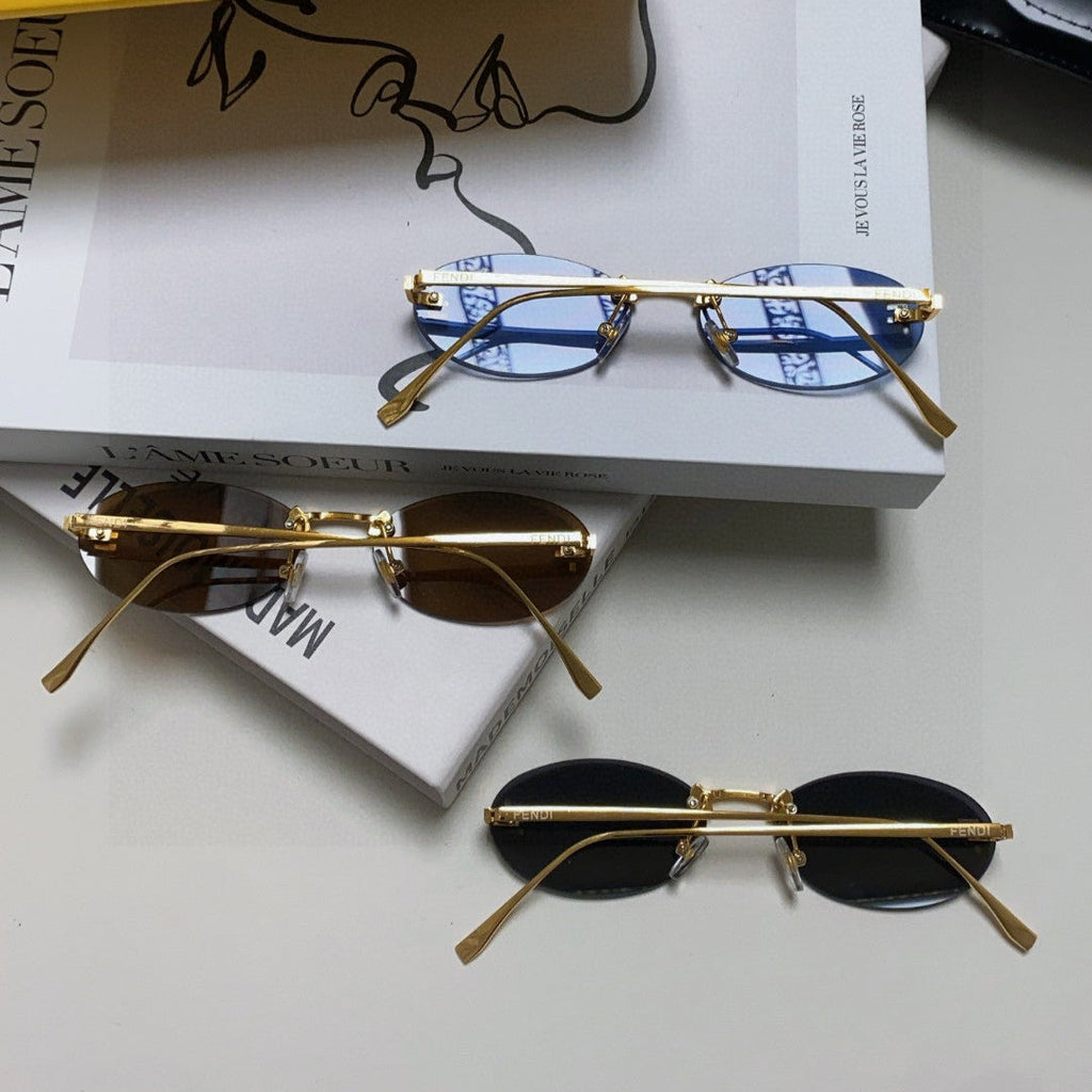 FENDI FIRST CRYSTAL RIMLESS OVAL FRAME SUNGLASSES 557152 IN METAL