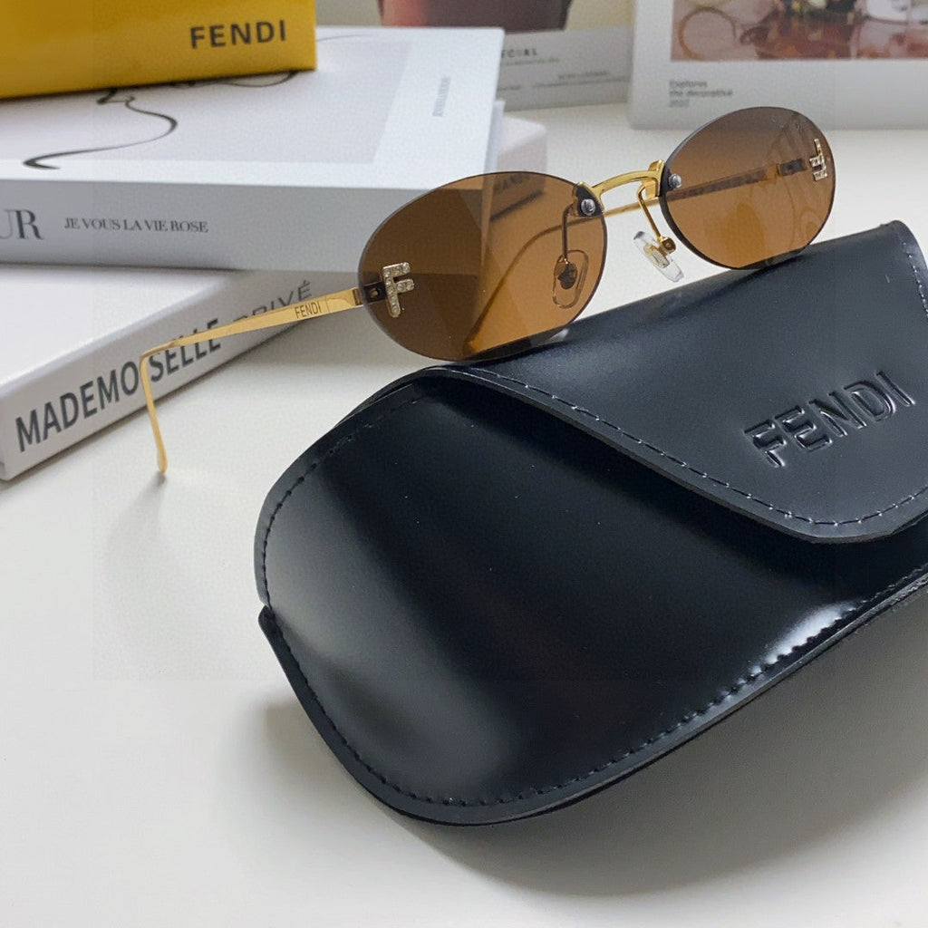 FENDI FIRST CRYSTAL RIMLESS OVAL FRAME SUNGLASSES 557152 IN METAL