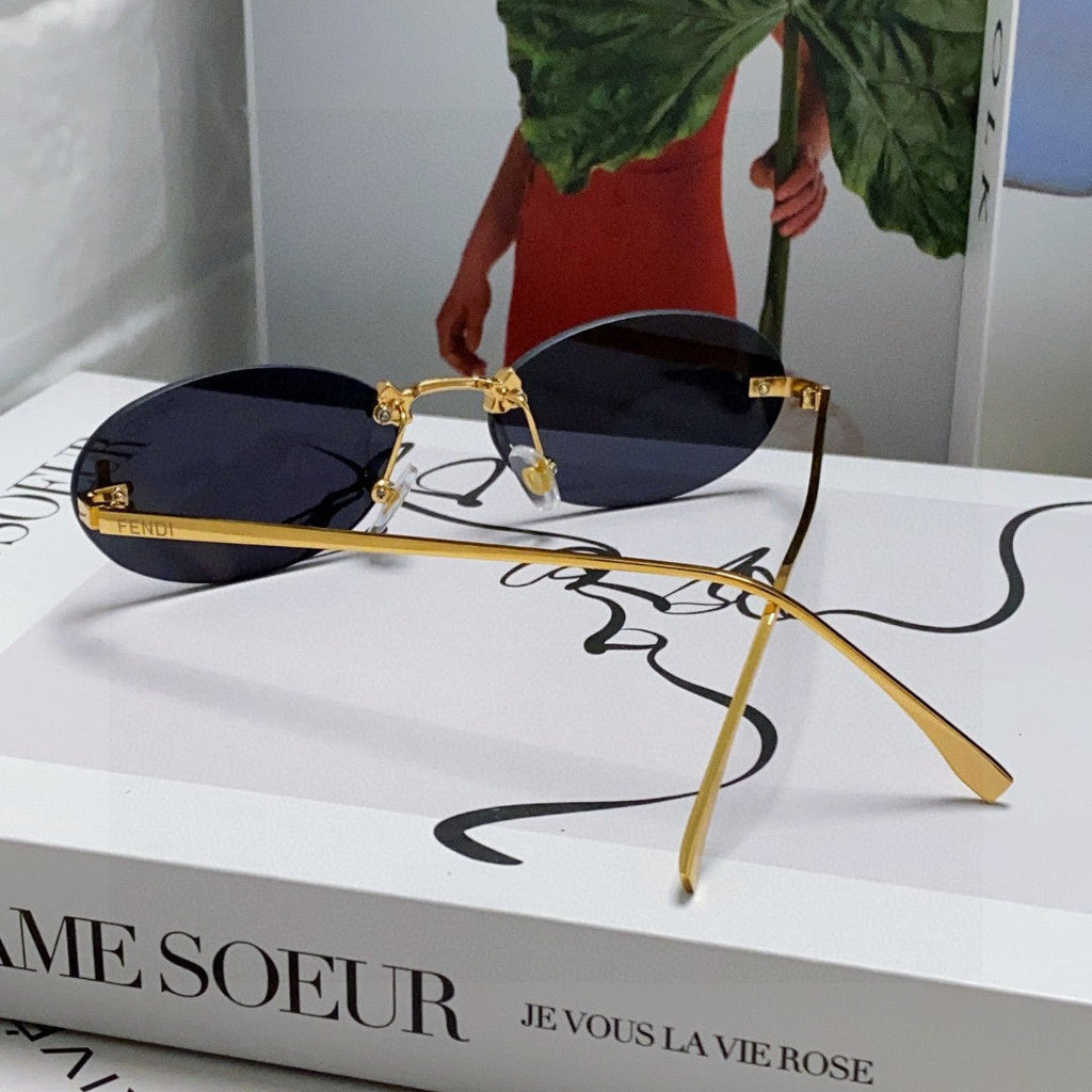 FENDI FIRST CRYSTAL RIMLESS OVAL FRAME SUNGLASSES 557152 IN METAL