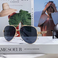 LOUIS VUITTON PILOT SUNGLASSES 581364 IN GOLD METAL BLACK LENSES