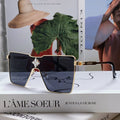 LOUIS VUITTON CYCLONE SUNGLASSES Z1700U IN GOLD METAL BLACK LENSES