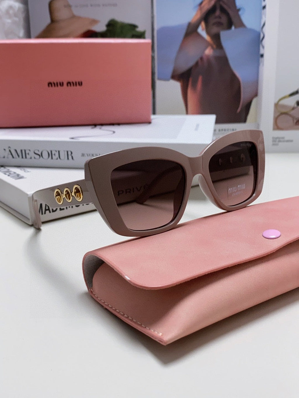 MIU MIU LOGO CAT EYE SUNGLASSES 513003 IN NUDE ACETATE
