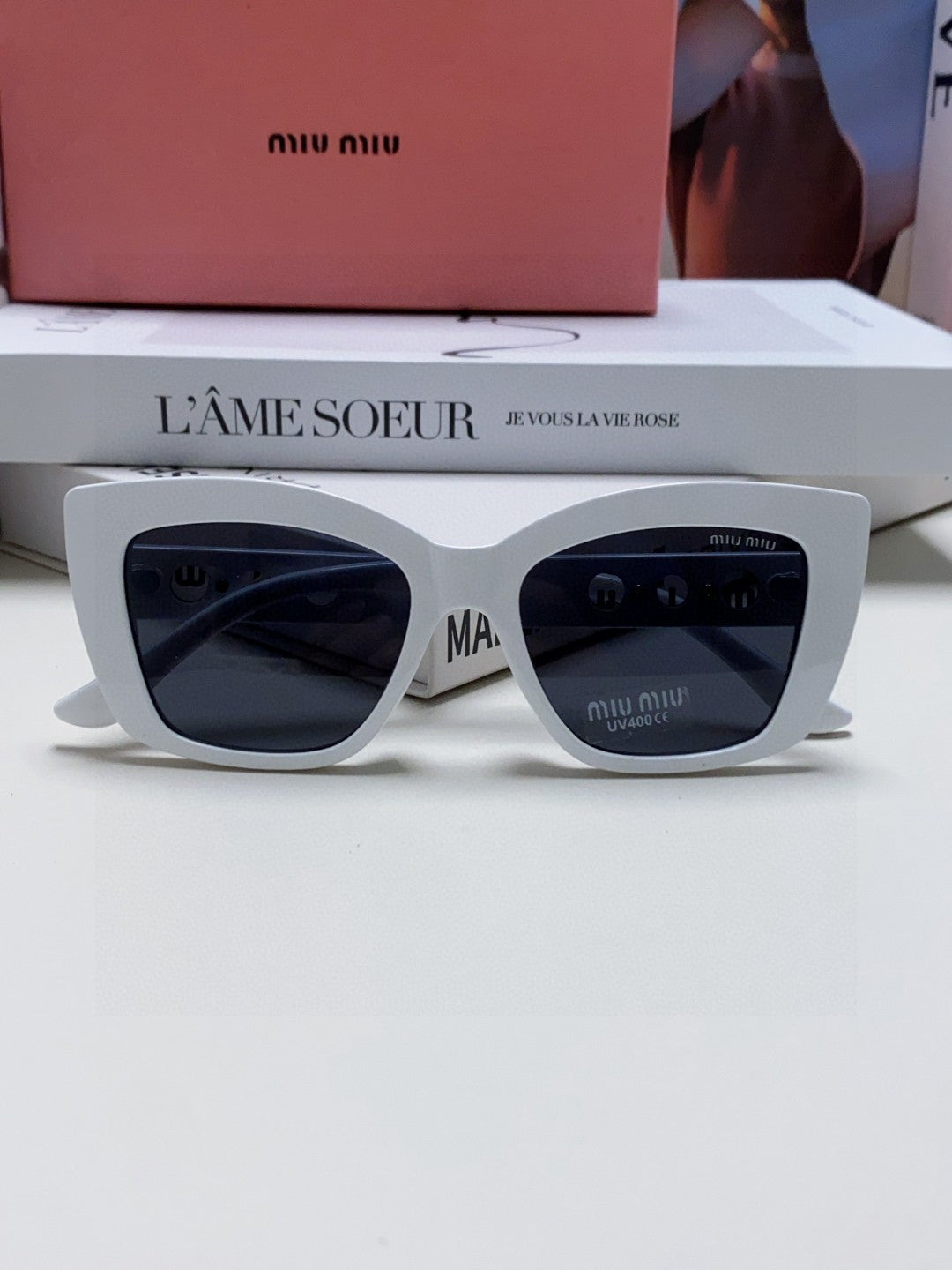 MIU MIU LOGO CAT EYE SUNGLASSES 513004 IN WHITE ACETATE