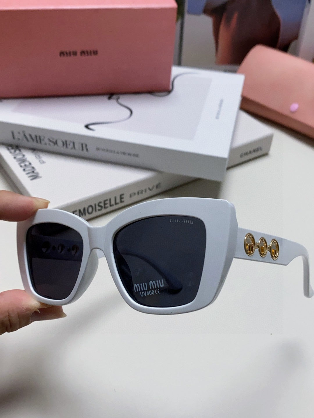 MIU MIU LOGO CAT EYE SUNGLASSES 513004 IN WHITE ACETATE