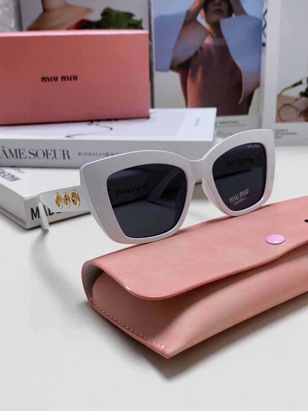 MIU MIU LOGO CAT EYE SUNGLASSES 513004 IN WHITE ACETATE