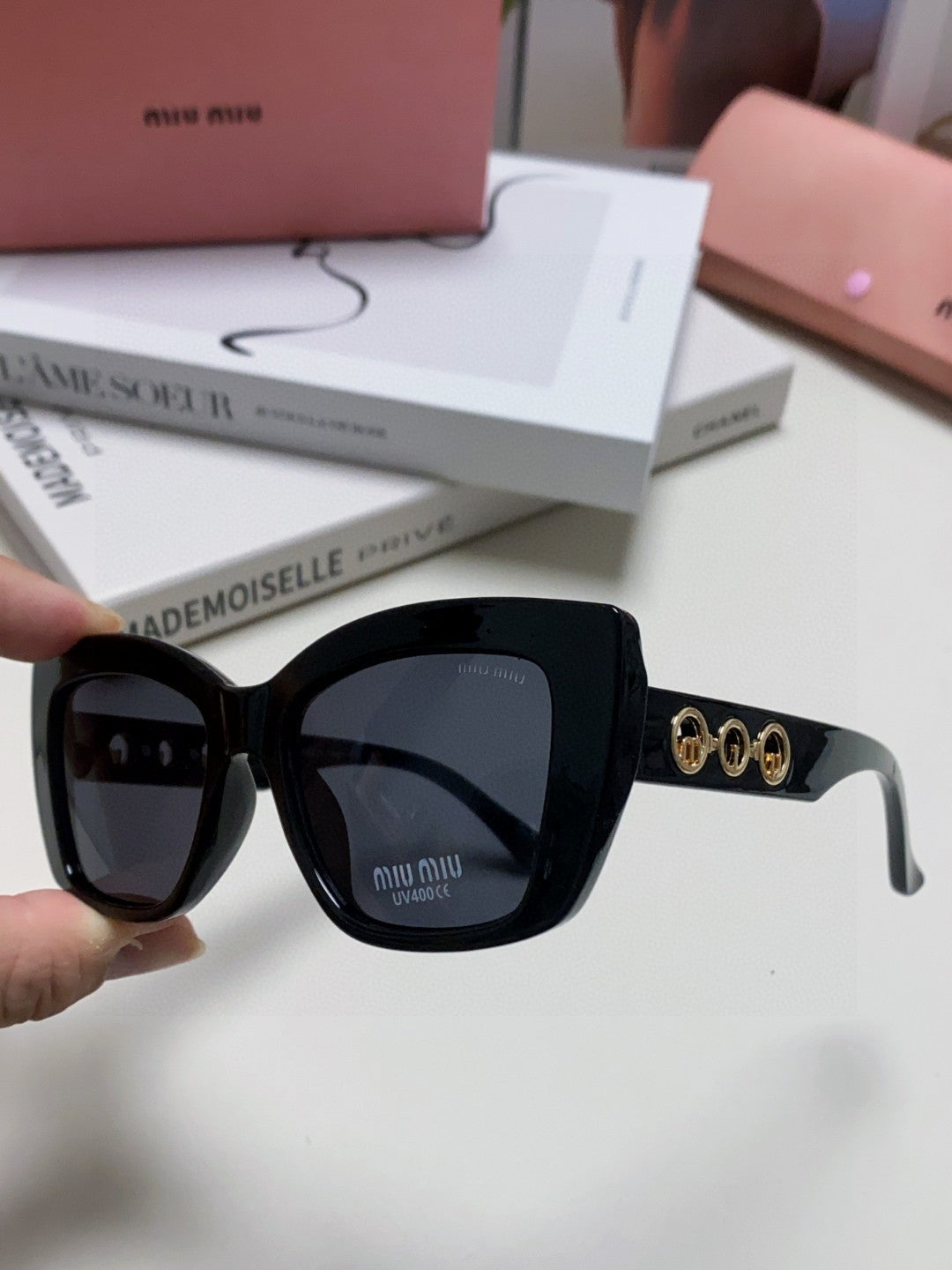 MIU MIU LOGO CAT EYE SUNGLASSES 513005 IN BLACK ACETATE