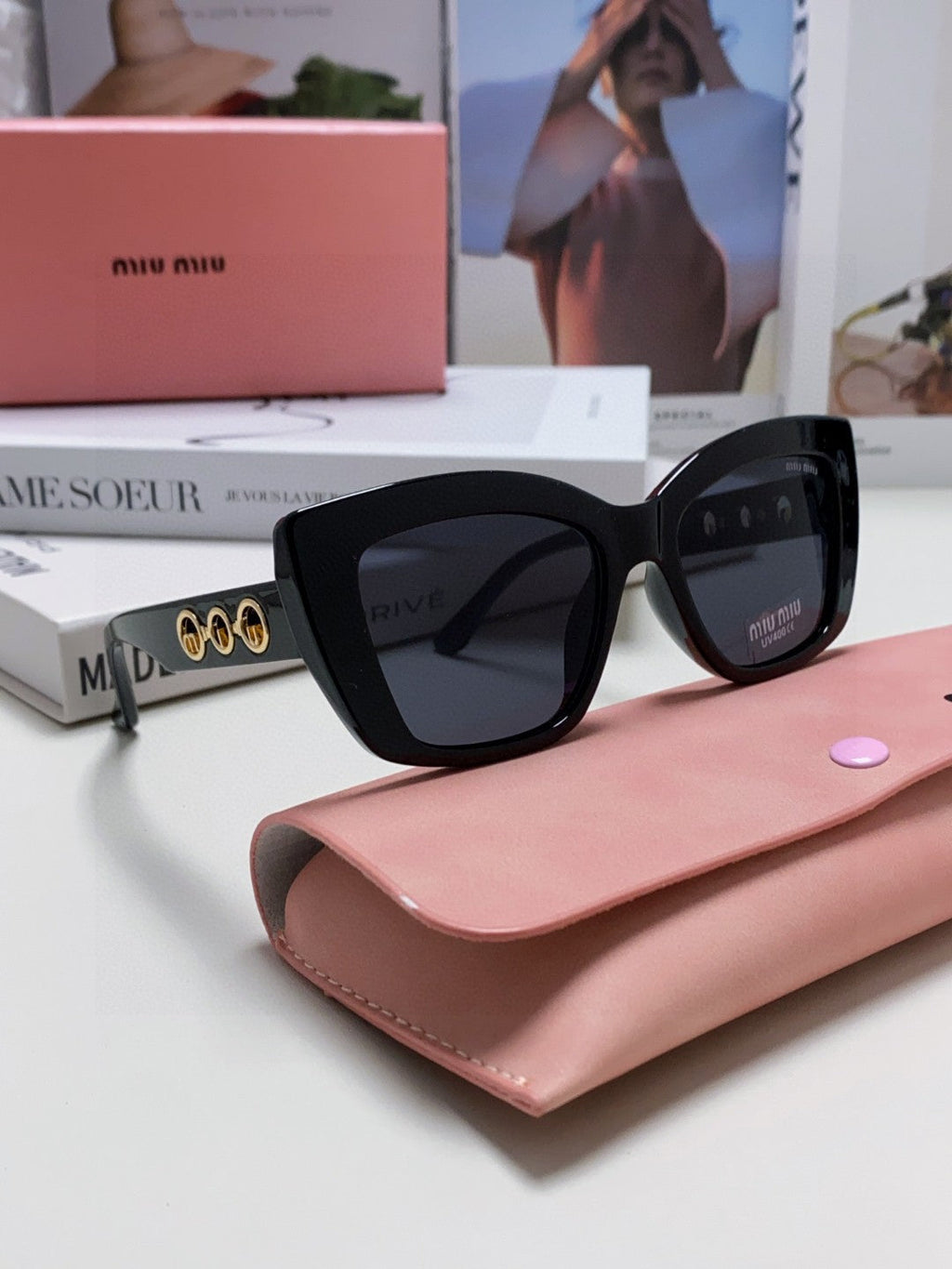 MIU MIU LOGO CAT EYE SUNGLASSES 513005 IN BLACK ACETATE