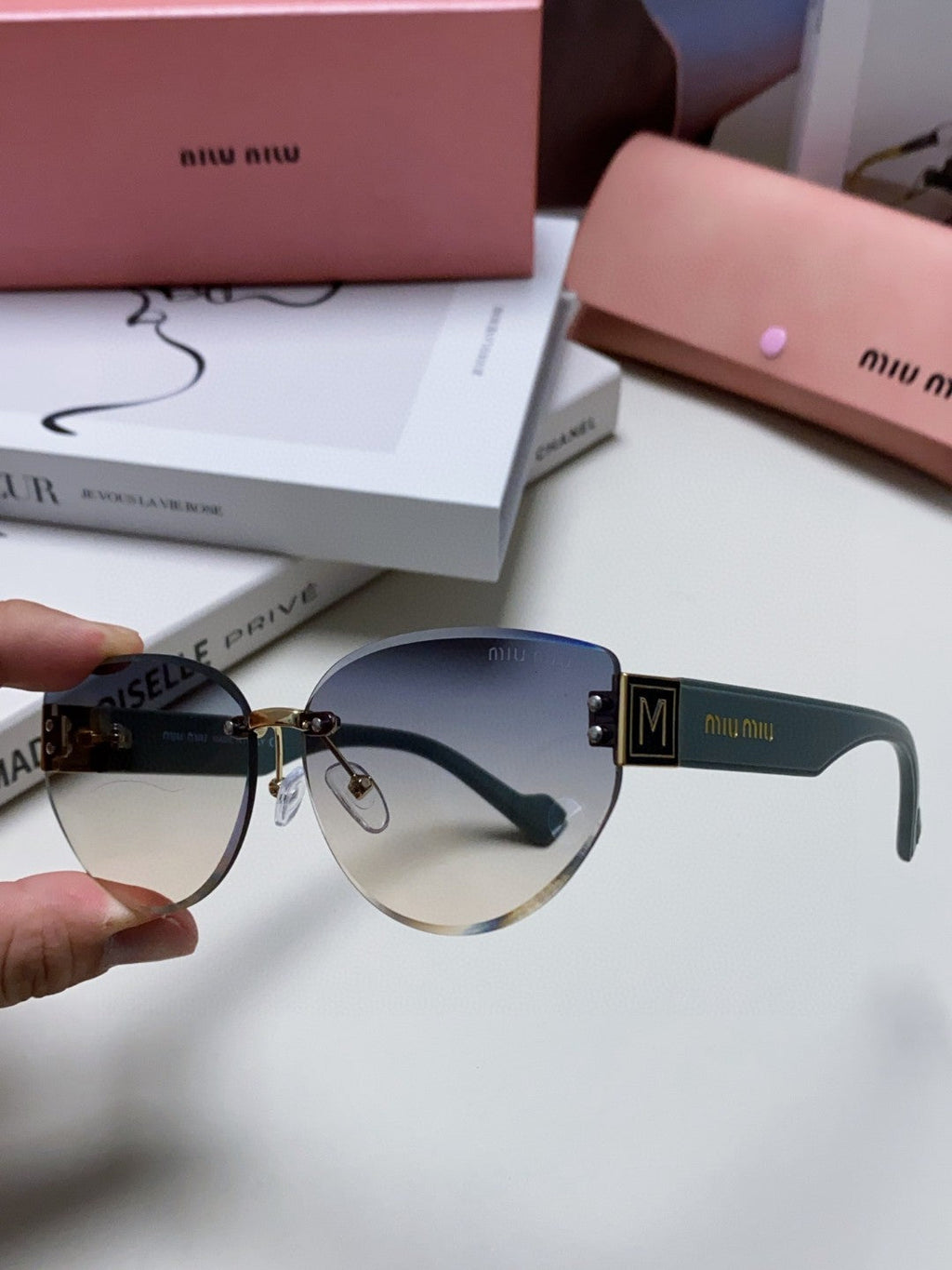 MIU MIU LOGO SUNGLASSES 513012 IN BLUE ACETATE