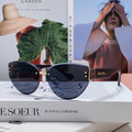 MIU MIU LOGO SUNGLASSES 513013 IN BLACK ACETATE
