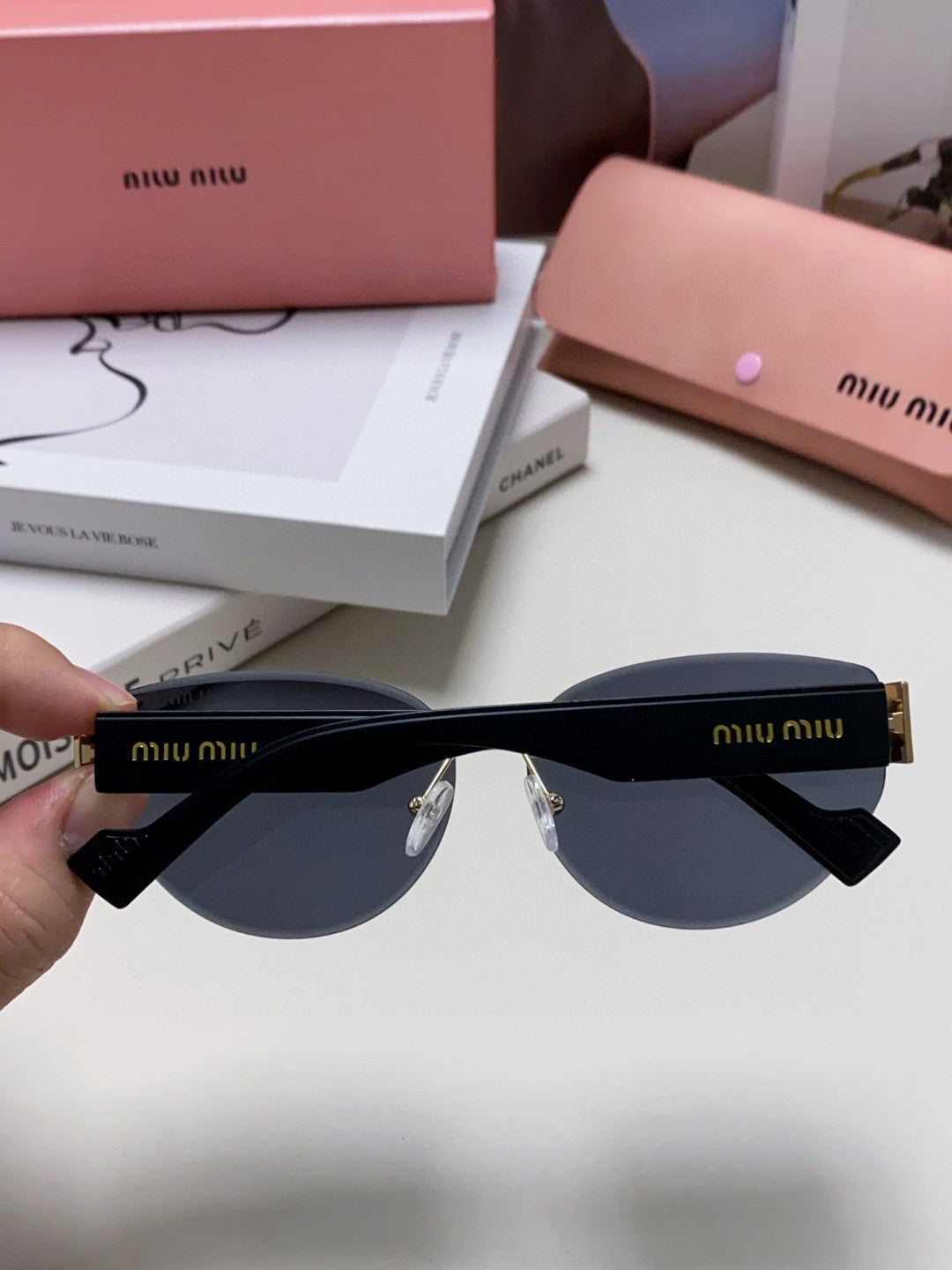 MIU MIU LOGO SUNGLASSES 513013 IN BLACK ACETATE