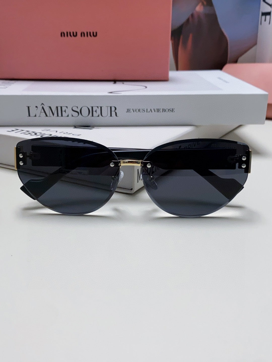 MIU MIU LOGO SUNGLASSES 513013 IN BLACK ACETATE