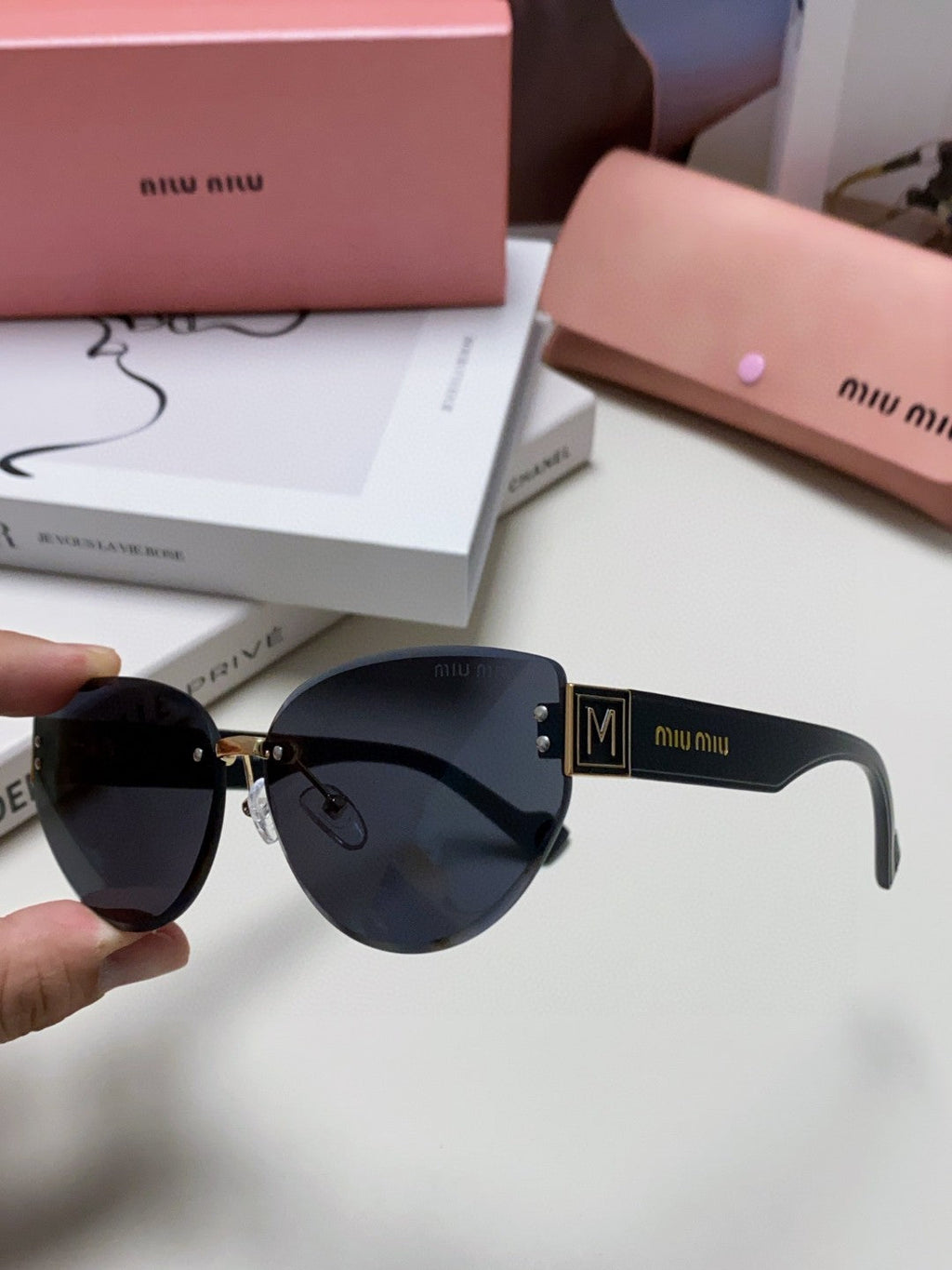 MIU MIU LOGO SUNGLASSES 513013 IN BLACK ACETATE