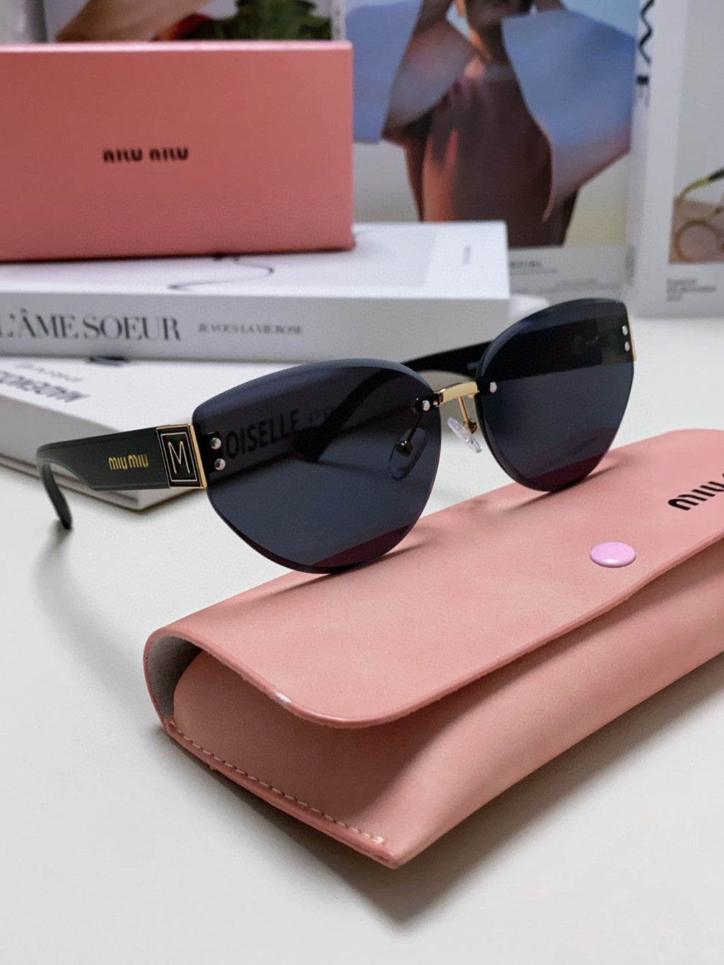 MIU MIU LOGO SUNGLASSES 513013 IN BLACK ACETATE